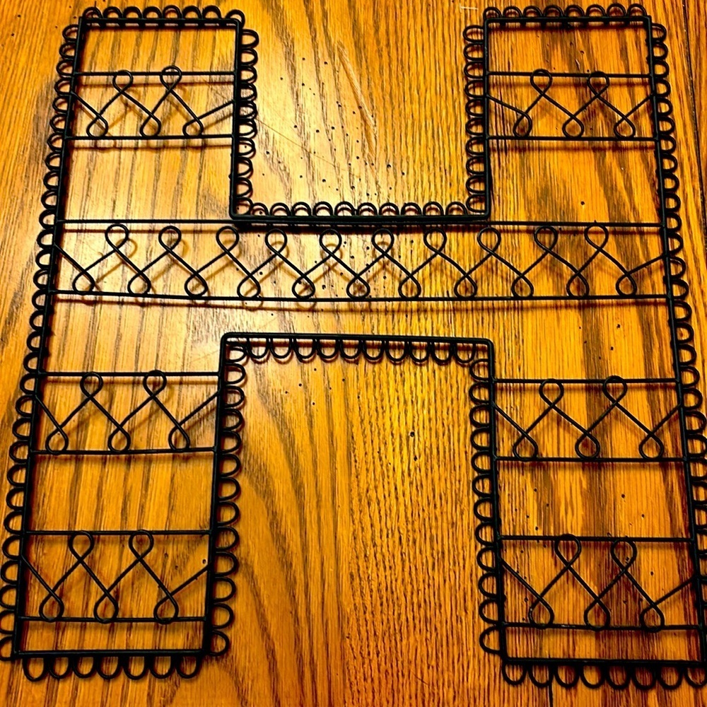 Pottery Barn H for wall to hang pictures on